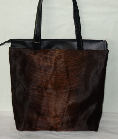 POSETA DE PIELE NATURALA URBANA